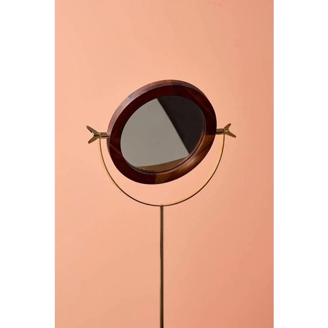 Floor mirror #4959 by Carl Auböck in brass and walnut. This piece is attributed to the mentioned designer/maker. It has no...