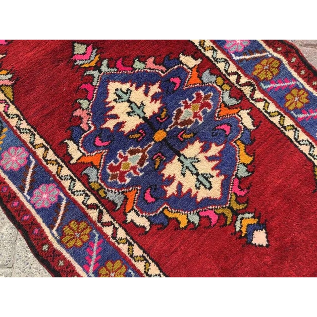 This gorgeous hand knotted Vintage Anatolian area rug is approximately 60 years old in excellent vintage condition. The...