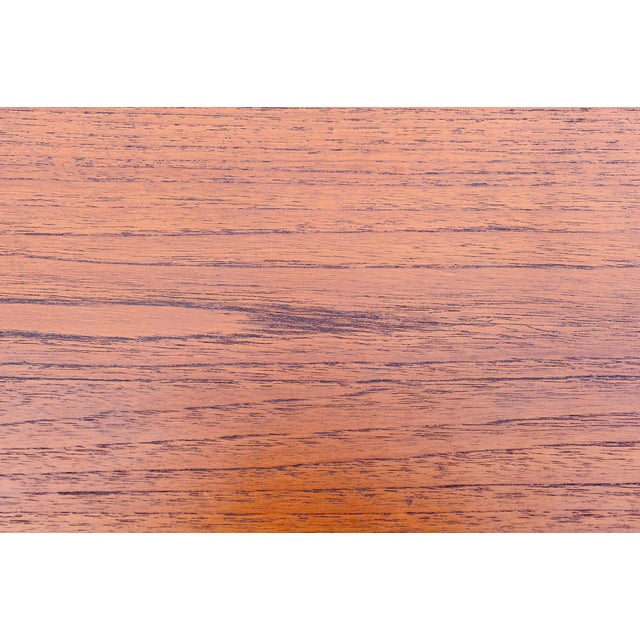 Sideboard in very good condition which includes a bar area, a cutlery drawer, lots of storage space This piece has an...