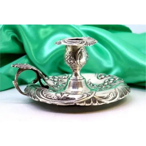 Silver Paddle with Raised Floral Motifs and Monogram Card, in Very Good conditions. Designed 1890 to 1919 This piece has...