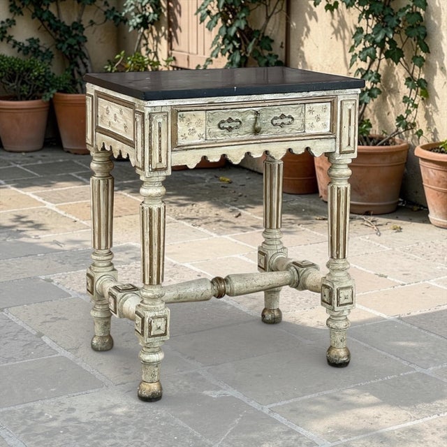 19th Century Italian Neoclassical Painted Marble Top End Table is an impressive work of the cabinetmaker's art on a...