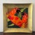 A striking handcrafted decorative art glass plate featuring a vibrant stylized crab against a backdrop of graceful seaweed...