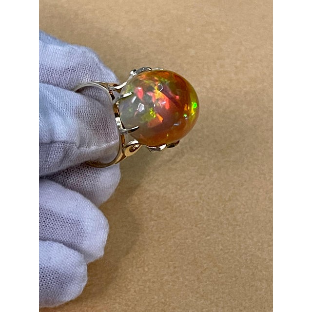 12 Carat Oval Shape Ethiopian Opal Cocktail Ring 14 Karat Yellow Gold For Sale In New York - Image 6 of 18