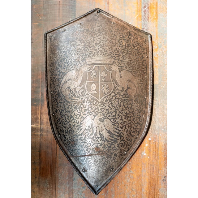We are selling this great Medieval or Renaissance Revival style etched steel shield. This shield has great decoration with...