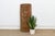 This 46-inch carved post is a Māori piece from Aotearoa, New Zealand, worked from a single dense log with a deep convex...