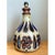 This table lamp presents a bold, sculptural silhouette rooted firmly in 1960s and 70s studio ceramic tradition, its wide,...