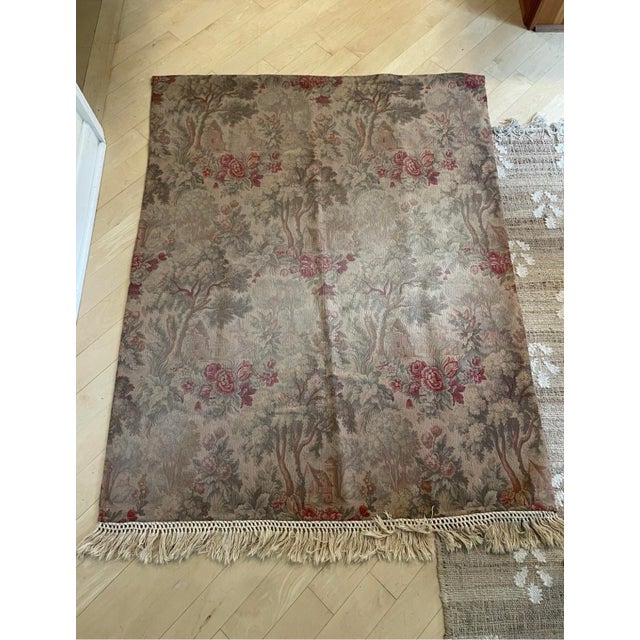 The Vintage French Woven Garden Floral Scene Tapestry is a unique and charming wall hanging featuring a floral pattern,...