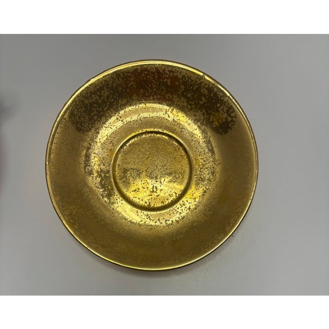 Vintage Japanese lusterware footed teacup and saucer with a rich gold iridescent finish and colorful fruit design...