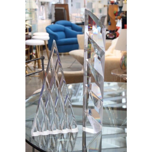 Two large lucite sculptures that we purchased demo an estate. The estate claimed they were done by an artist named Joe...