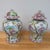 A striking pair of large decorative porcelain ginger jars by Altfield Hong Kong, featuring exuberant hand-painted...
