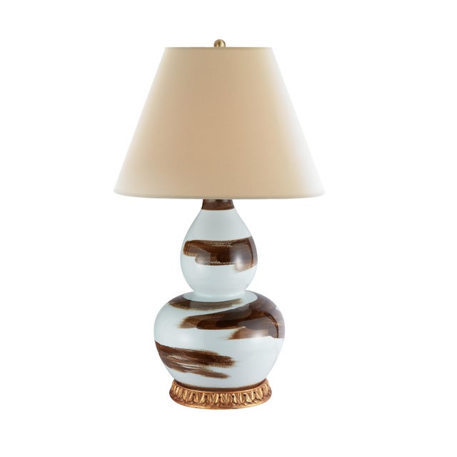 Uninhibited brushstrokes bring a casual elegance to this classically shaped double gourd ceramic lamp. Generously sized,...