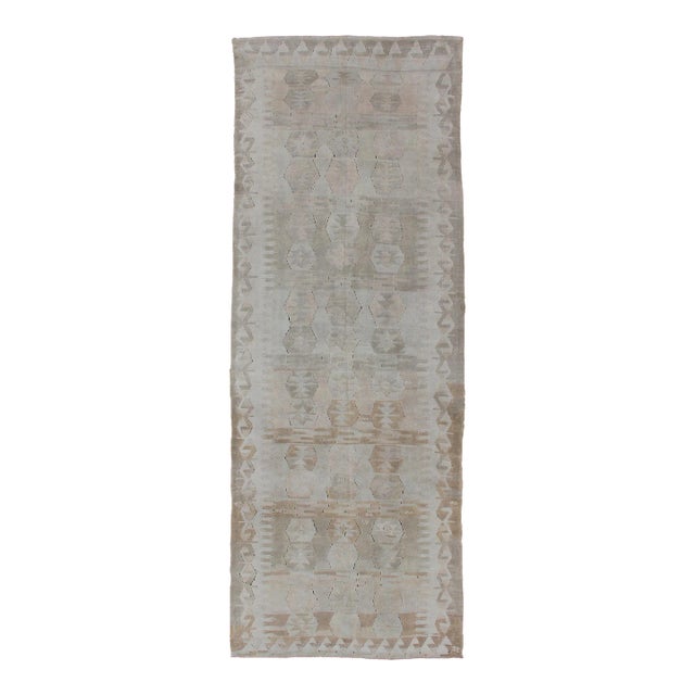 Cream, Brown, and Green Hand Woven Antique Turkish Kilim Flat-Weave Gallery Runner For Sale