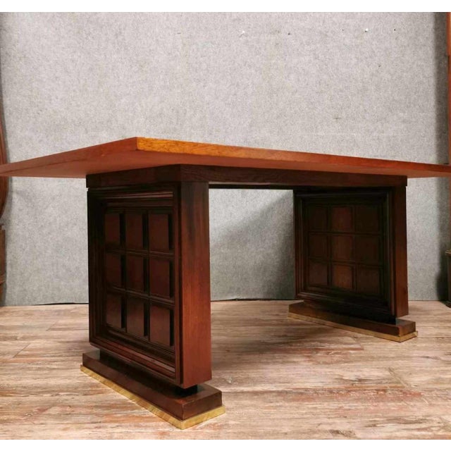Desk or conference table after charles dudouyt, art deco period, circa 1940 made of mahogany with a base characteristic of...
