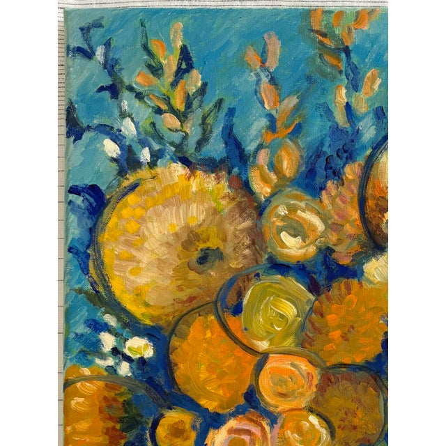 Expressive impressionistic floral still life painted in thick impasto strokes of deep blues and navy with gold, rust and...