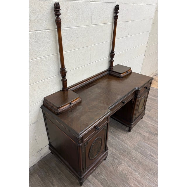 This is a stunning and exceptional antique Berkey & Gay mahogany vanity or kneehole desk dating to the late 1920s or early...