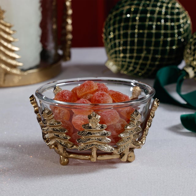 Celebrate the season with this festive decorative bowl, thoughtfully crafted from clear glass and framed by a sculptural...