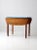 A vintage Napanee kitchenette table by Coopes Brothers & Zook, dating circa 1913–1935. The wooden drop-leaf table features...
