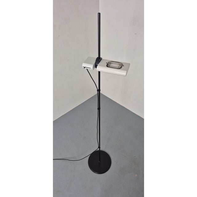 Artemide floor lamp, model Aton Terra by Ernesto Gismondi from the 1980s. The lamp is height-adjustable and dimmable. This...