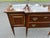 Timeless Federal-style mahogany sideboard featuring beautiful inlaid details, original brass gallery rail, brass hardware,...