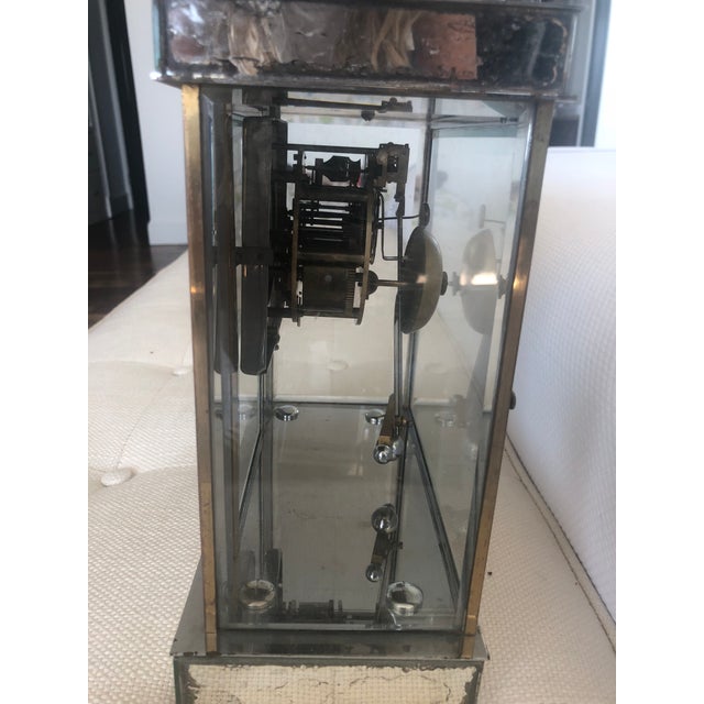 A beautiful one of a kind piece. Incredible workmanship. Absolute perfection. French art decor mirror veneer mantel clock....