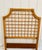 Vintage twin bamboo headboard with lattice grid design, curved pagoda shape, and a well-preserved honey patina. A timeless...