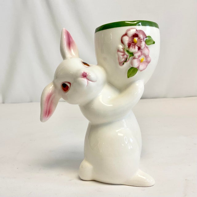 A lovely little whimsical bunny egg cup holder is a great Easter or Spring decorative item. The figurine bunny is adorable...