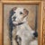 An oil on canvas portrait painting of a wire haired terrier dog. Framed. Unsigned