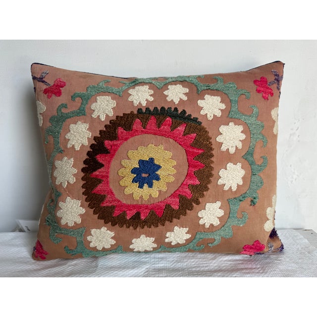 Bring a touch of history and artistry to your space with this 1900s Suzani pillow, sized at 16" x 13". Hand-embroidered...