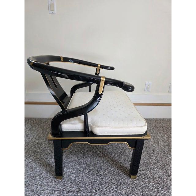 Century Chair Company James Mont style black laquer horseshoe chair. Glossy finish, brass accents, Chinese Ming style....