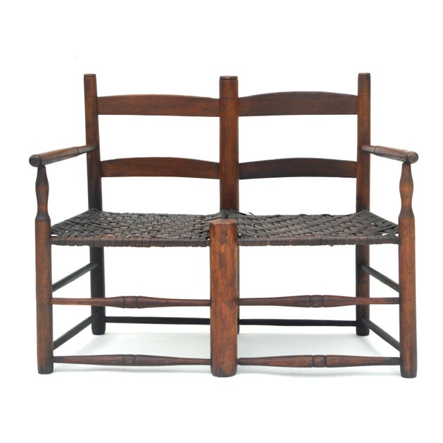 An antique Early American ladderback bench with split woven seats, hand built original splint seat with very nice patina....