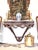 A fine serpentine carved oak wall mounted console, ca. 1780, with an open frieze, and a boldly carved pendant laurel swag...