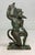 Up for sale is an exquisite antique bronze statue of a Satyr, a mythical creature from Greek mythology. This sculpture...