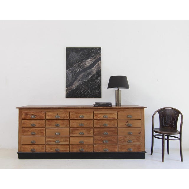 Vintage drawer unit shop counter from the 1910s/1920s, Bauhaus era. Solidly crafted from softwood. Restored condition with...