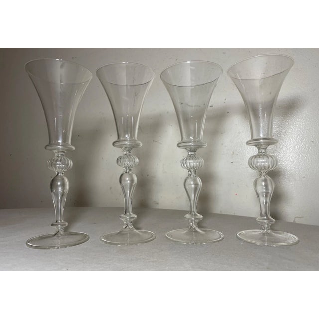 Elevate your table setting with this set of 4 vintage Venetian stemware glasses. Crafted through the traditional technique...