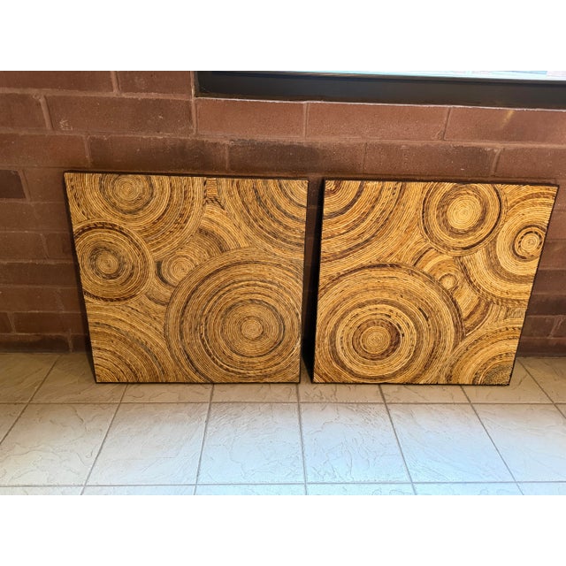 A striking pair of vintage 1970s organic modern wall panels handcrafted from coiled natural fibers arranged in a...
