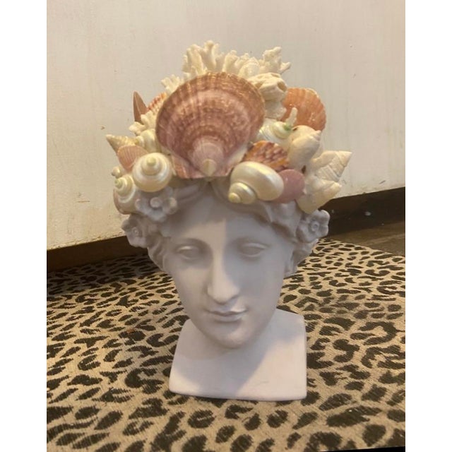 Shell-Encrusted Bust in Farrow & Ball “Calluna” with Hidden Candle Holders. By May River Neptune. A singular sculptural...