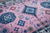 A hand-knotted wool rug from the Kazak collection, made in India and measuring 8' x 10'. Classic drawing on an ivory...
