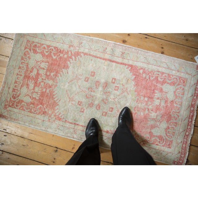 :: Large scale central floral filled medallion with finned relief atop a covered field of inwardly directed meandering...