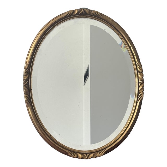 Antique Oval Gilt Mirror in Carved Wood, 1940s For Sale