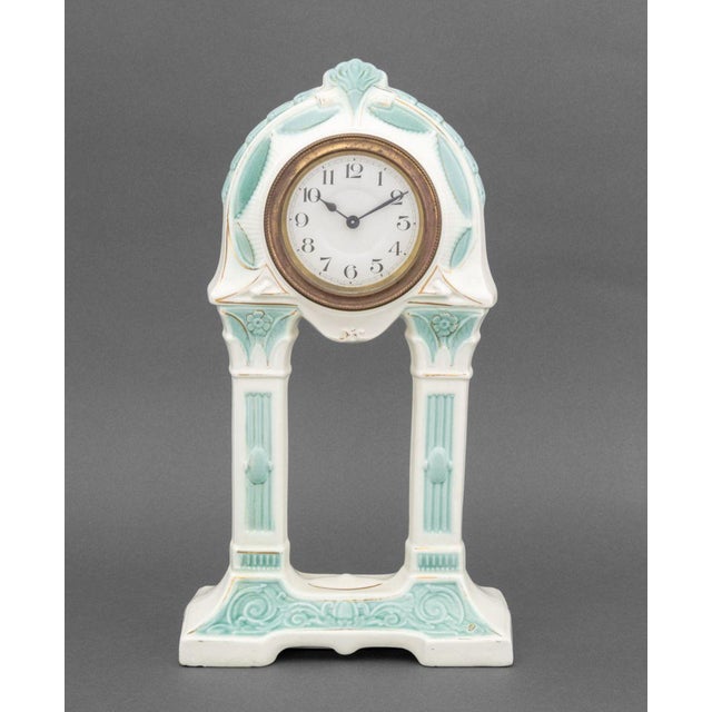 German Art Deco Blue and White Ceramic Mantle Clock, dome column design with brass and white painted clock face, marked...