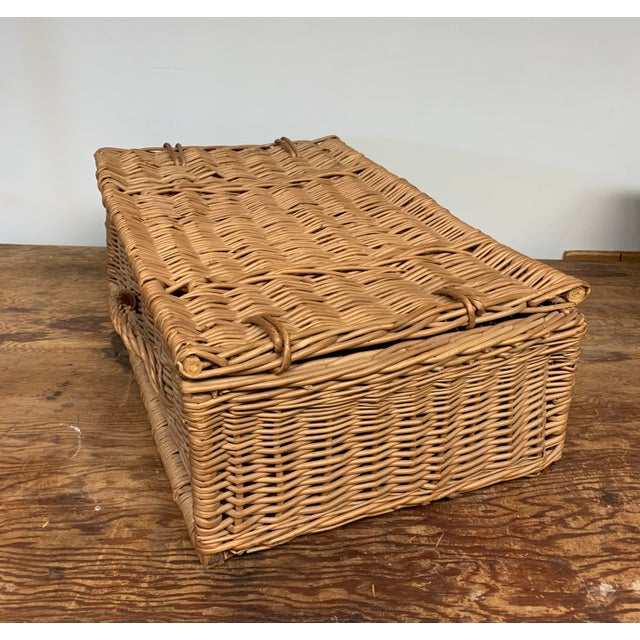 An older vintage handmade woven wicker willow branch basket with hinged hamper style lid. Great box form for organizing...