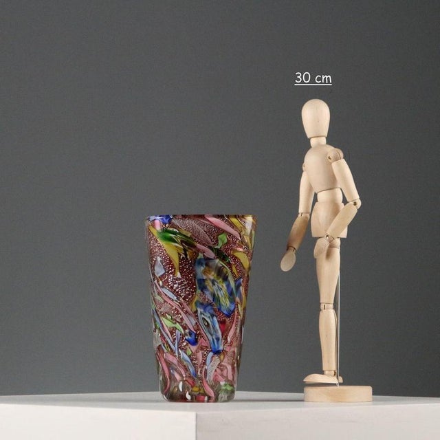 Tutti Frutti glass vase in the style of Dino Martens for Aureliano Toso. Polychrome and silver inclusions. This piece is...