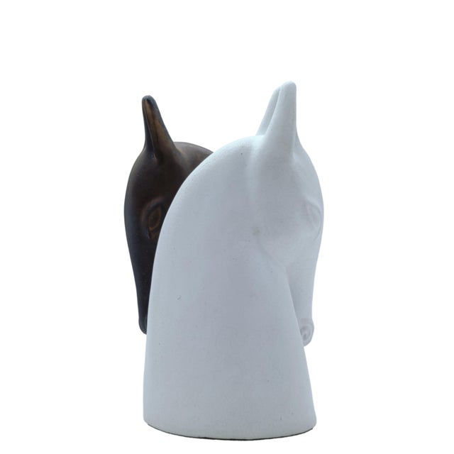 Pair of ceramic/earthenware sculptures created by Danish artist Anette Edmark, the sculptures are in the form of a horse's...