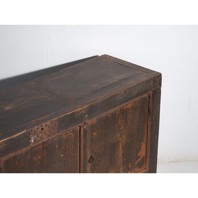 Antique chinese sideboard in solid wood, nearly two metres in length, originally from china and dated toward 1930. An...