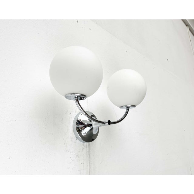 Elegant wall lamp by Temde, designed by E.R. Nele. Often mistakenly attributed to Max Bill. Classic yet timelessly modern,...