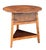 A handsome large English cricket table of patinated oak from the Georgian Era - featuring the traditional round or...