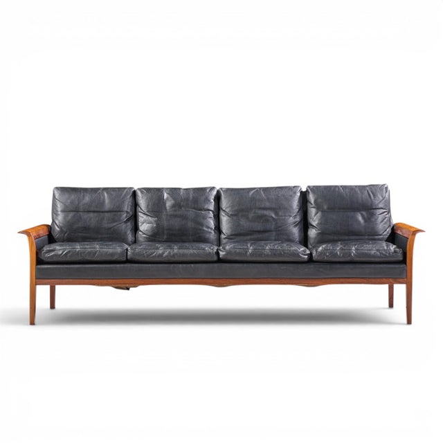 Knut Saeter for Vatne Møbler Mid Century Norwegian Rosewood and Leather Sofa This sofa measures: 86.5 wide x 31 deep x...