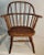 19thc Sack back child's Windsor extended arm chair in fine condition with a nice mellow patina. Found in Pennsylvania.