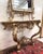 Important curved château console + Louis XV style mirror in gilt and silvered wood with a highly ornate shape and abundant...