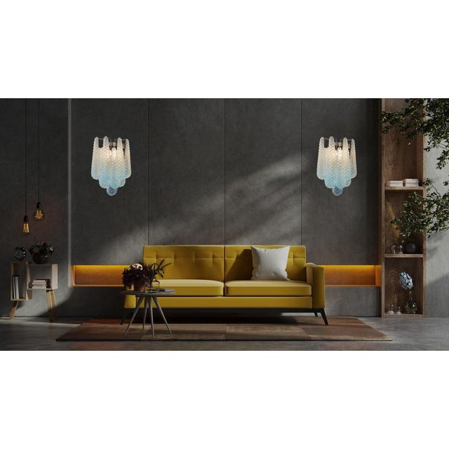 Fantastic pair of vintage Murano wall sconce made by 10 blue glass petals (transparent crystal, smooth outside, with...